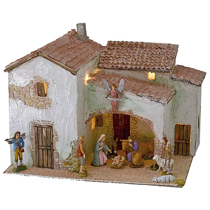 Illuminated stucco village complete with figurines cm 40x30x31 h