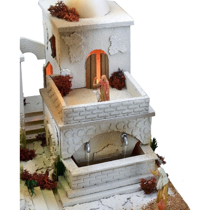 Pesebre árabe con luces, fuente de doble grifo y fuego