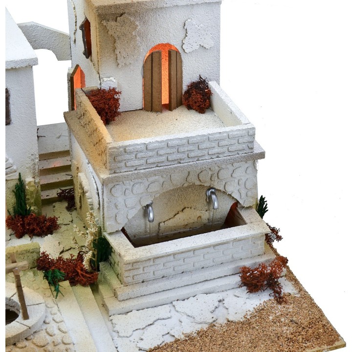 Arab nativity scene with lights, double tap fountain and