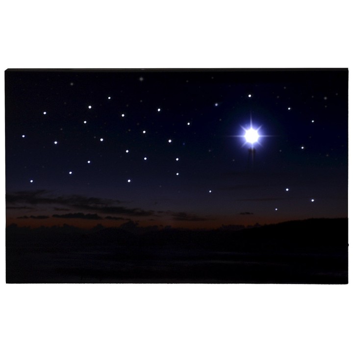 Cielo estrellado con paisaje al atardecer y estrella polar