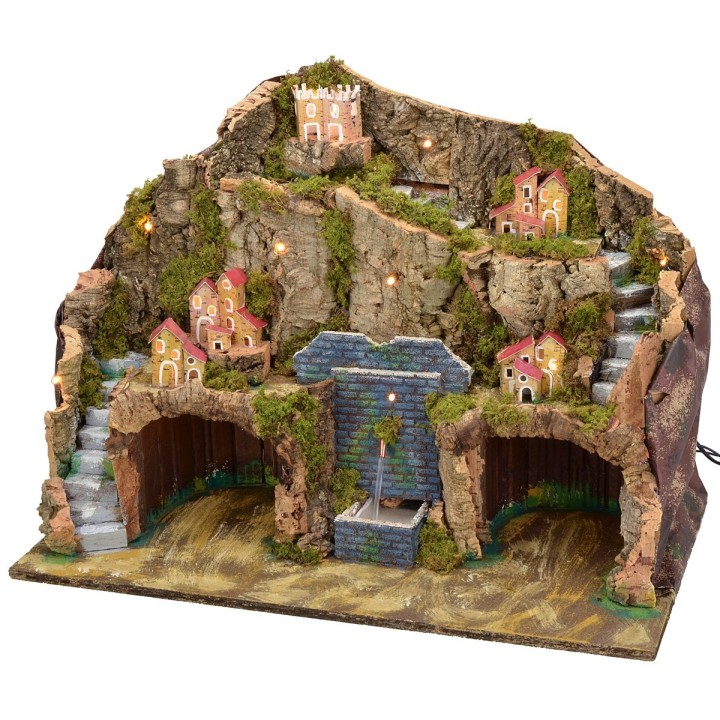 Illuminated nativity scene with functioning fountain and grotto