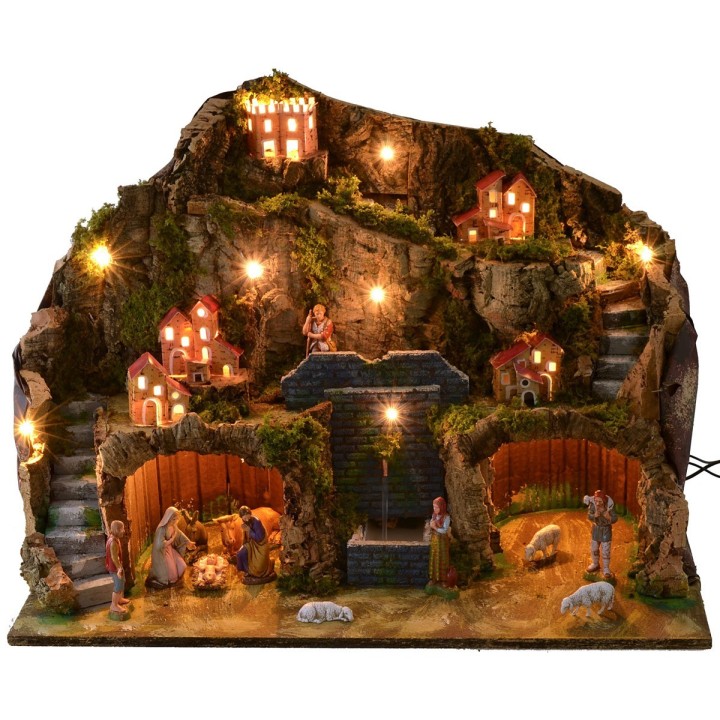 Presepe illuminato con fontana funzionante e grotta completo di