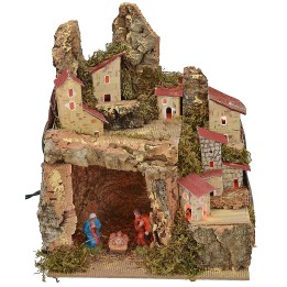 Presepe illuminato con paesaggio e grotta completa di Natività