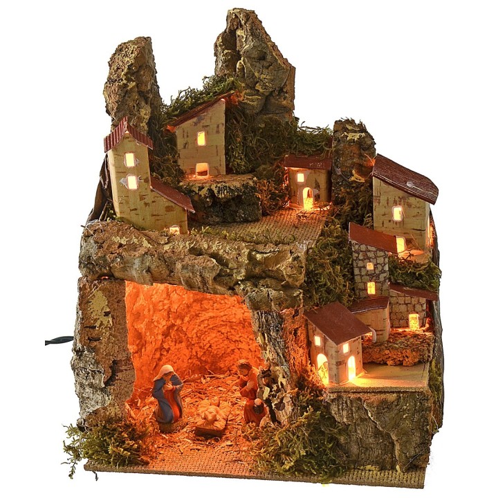 Belén iluminado con paisaje y cueva completa de Natividad de