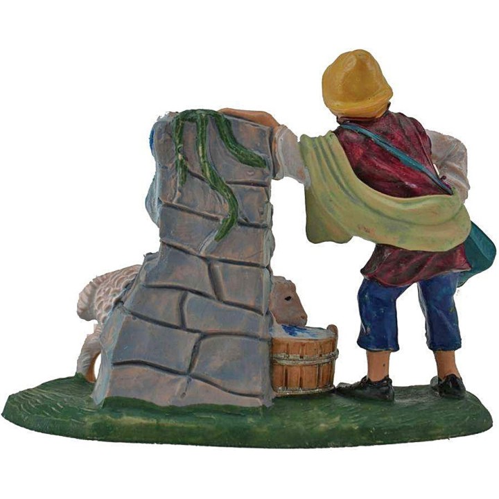 Pastore de 8 cm con oveja en la fuente en pvc