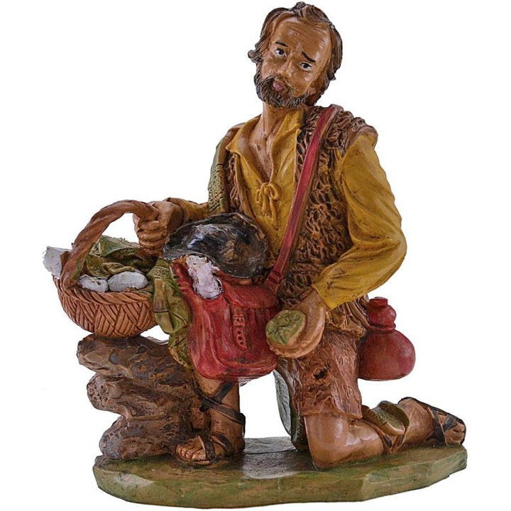 Hombre arrodillado con regalos 20 cm Euromarchi