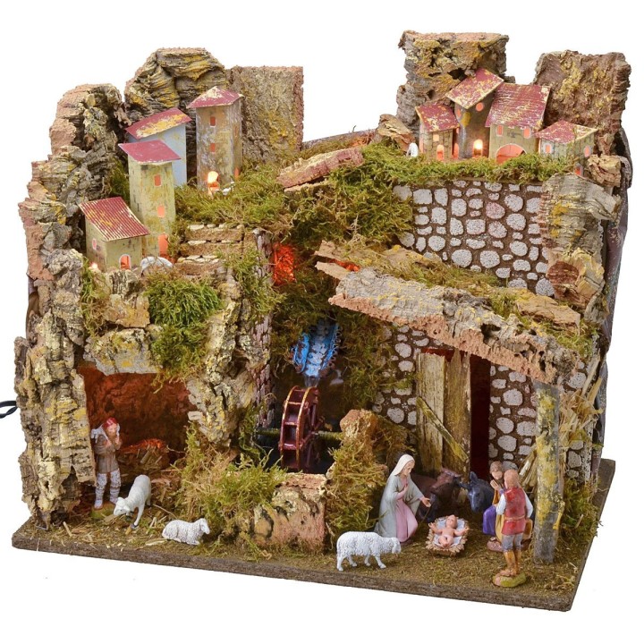 Pueblo iluminado completo con estatuas Landi y molino de agua