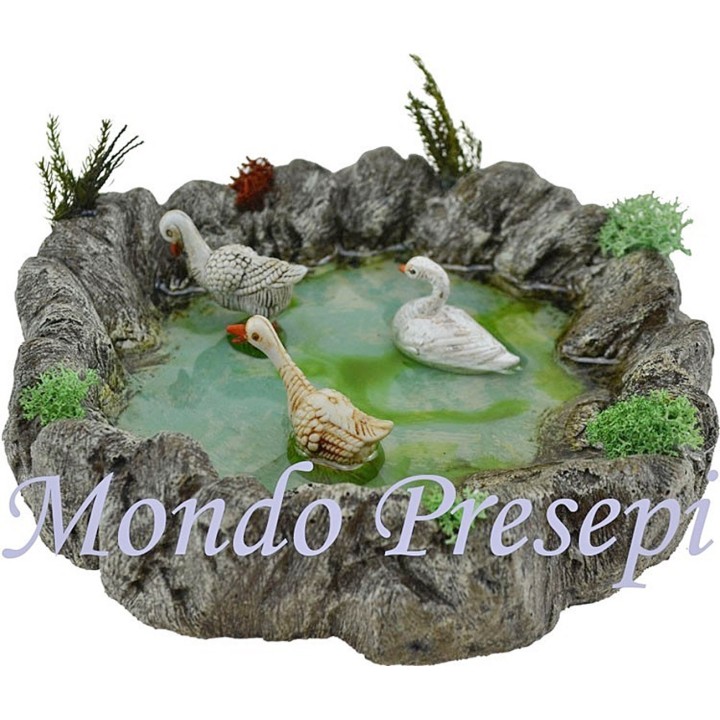 Estanque mágico de resina con cisnes