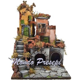 The crib with the village lit up and the mill 30x30x40 h.