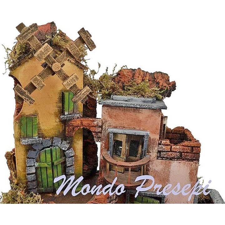 Pesebre con pueblo iluminado y molino 30x30x40 h.
