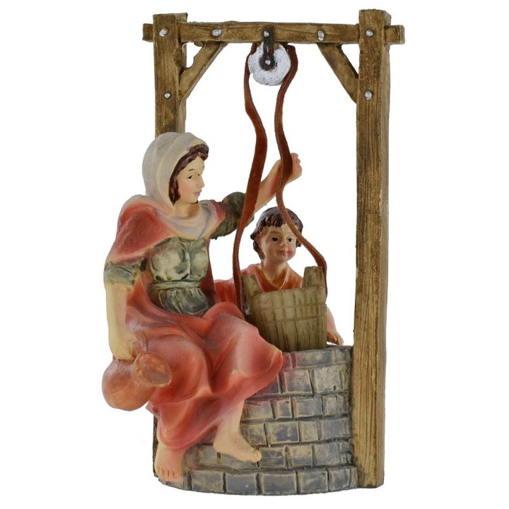 Mujer con niño en el pozo serie 10 cm en resina