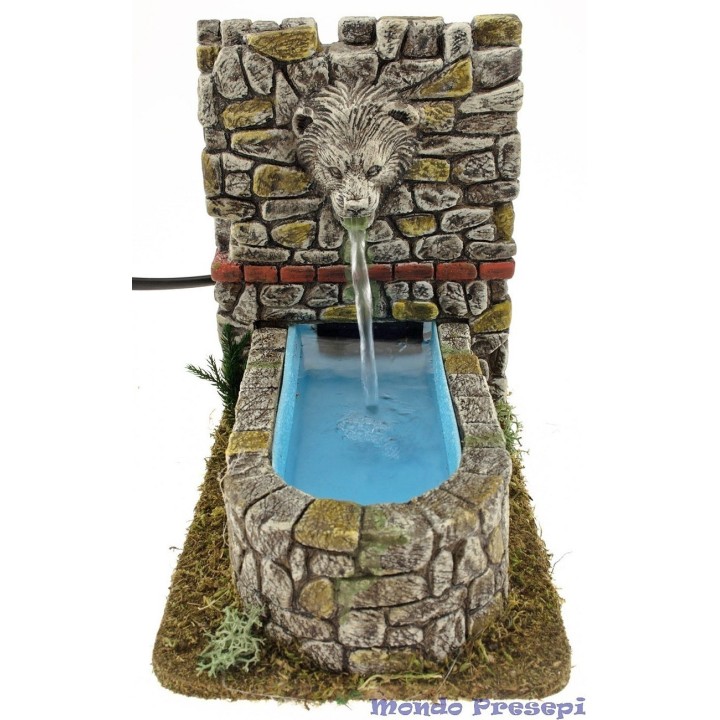 Fuente de belén con boca de león