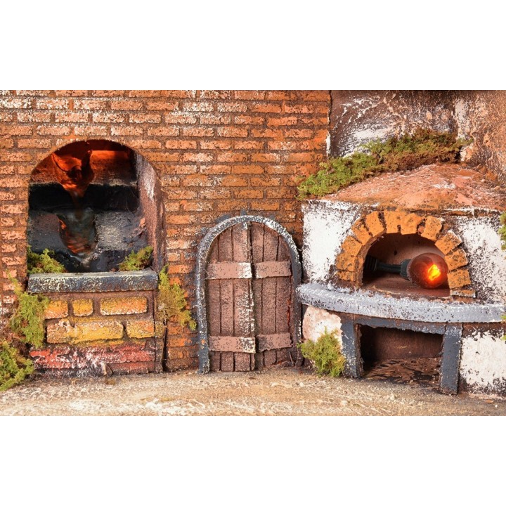 Borgo napoletano illuminato con forno, mulino a vento e cascata
