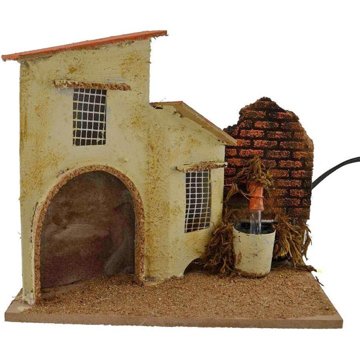 House with working fountain cm 19x13,5x18 h.