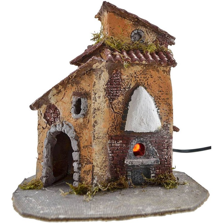 Resin house with working oven cm 19x15,5x22 h.