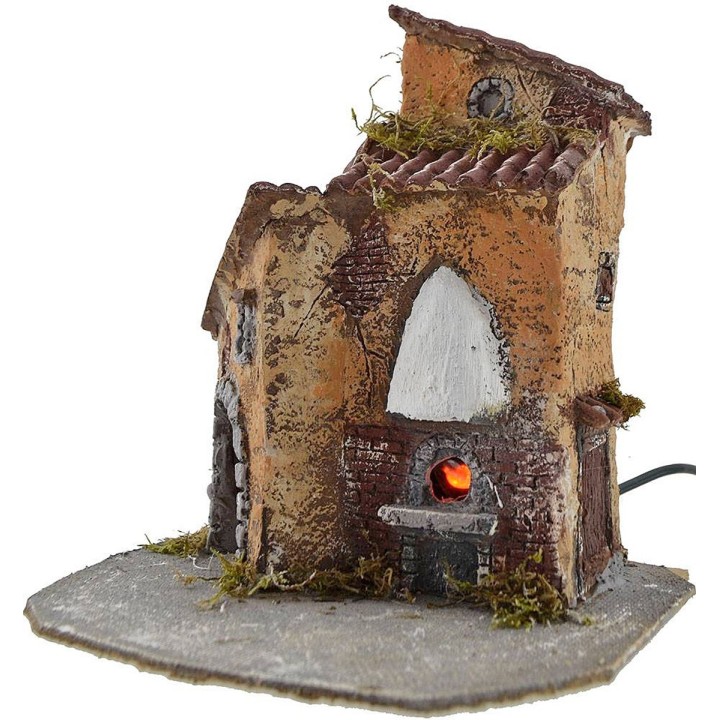 Resin house with working oven cm 19x15,5x22 h.