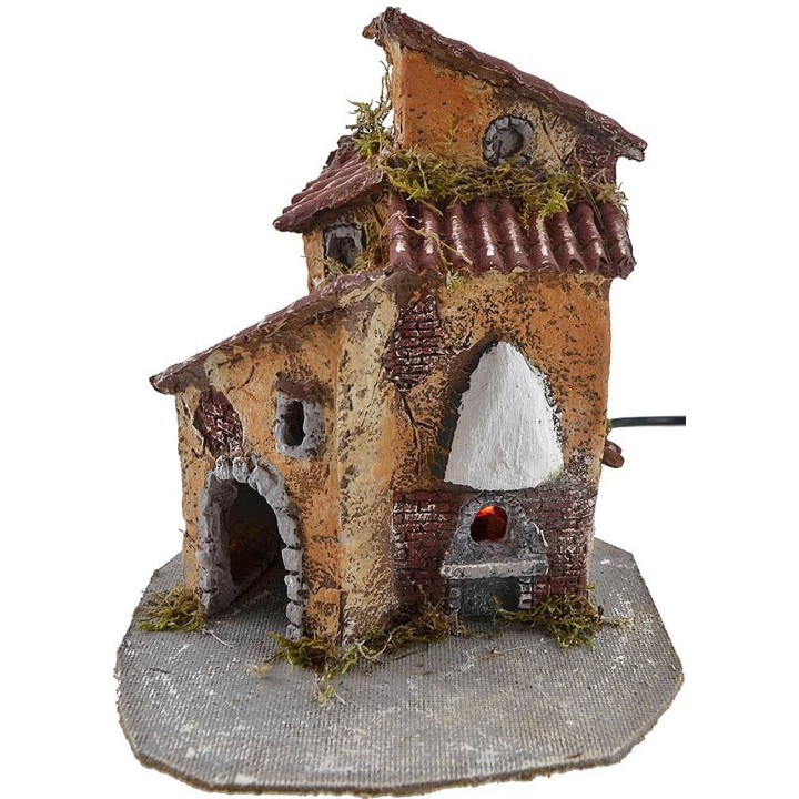 Resin house with working oven cm 19x15,5x22 h.