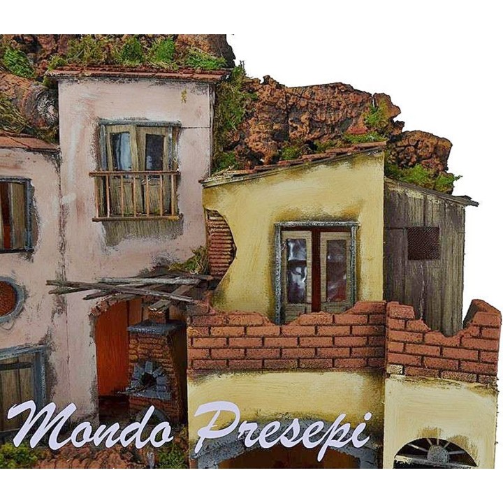 Pesebre con pueblo iluminado con fuente 60x40