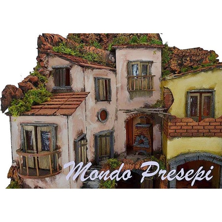 Pesebre con pueblo iluminado con fuente 60x40