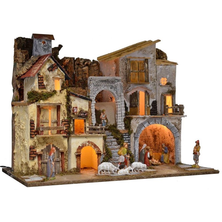 Pesebre iluminado completo con estatuas Landi con aldea y cueva