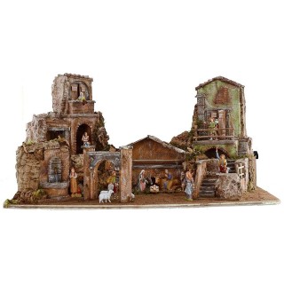 Presepe illuminato completo di statue Landi con case e fontana