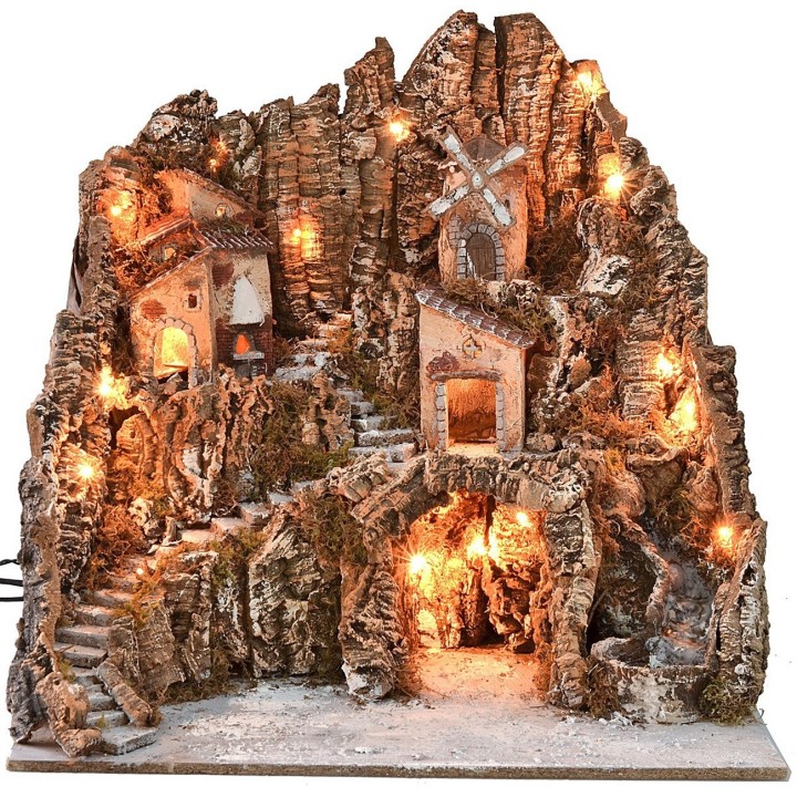 Belén iluminado con molino de viento, cascada y horno