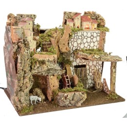 Scenografia per presepe illuminata con mulino ad acqua