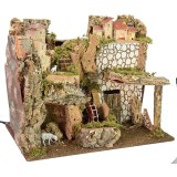 Scenografia per presepe illuminata con mulino ad acqua
