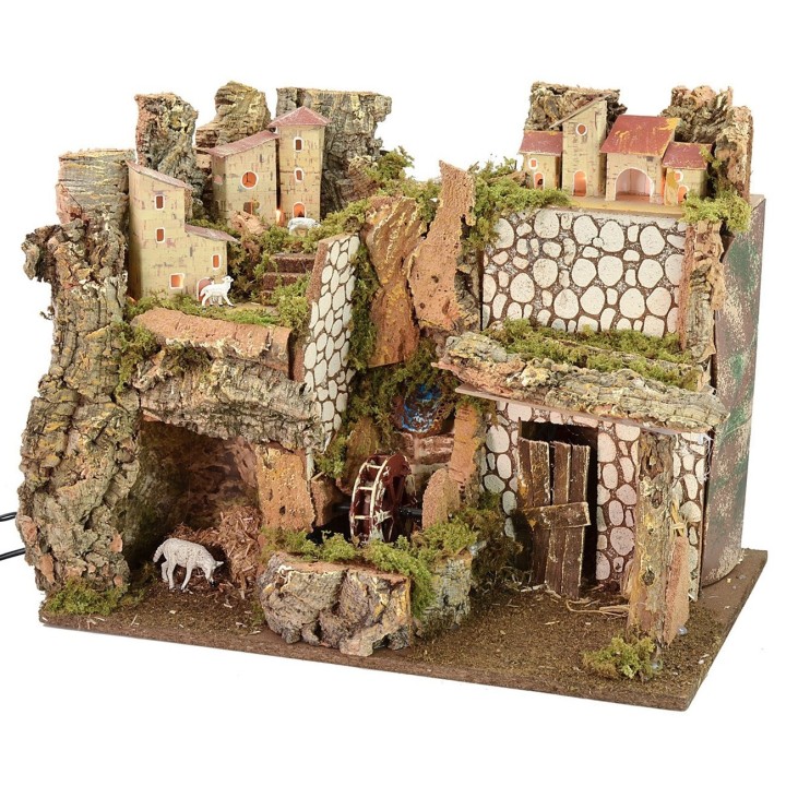 Scenografia per presepe illuminata con mulino ad acqua