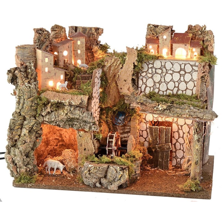 Scenografia per presepe illuminata con mulino ad acqua