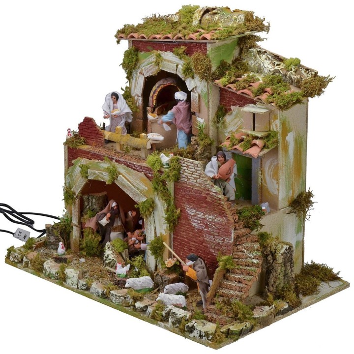 Pesebre con estatuas en movimiento cm 57x37x50 h
