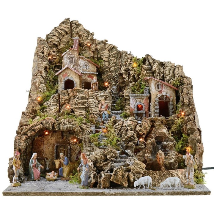 Belén iluminado completo con estatuas Landi y horno y cascada
