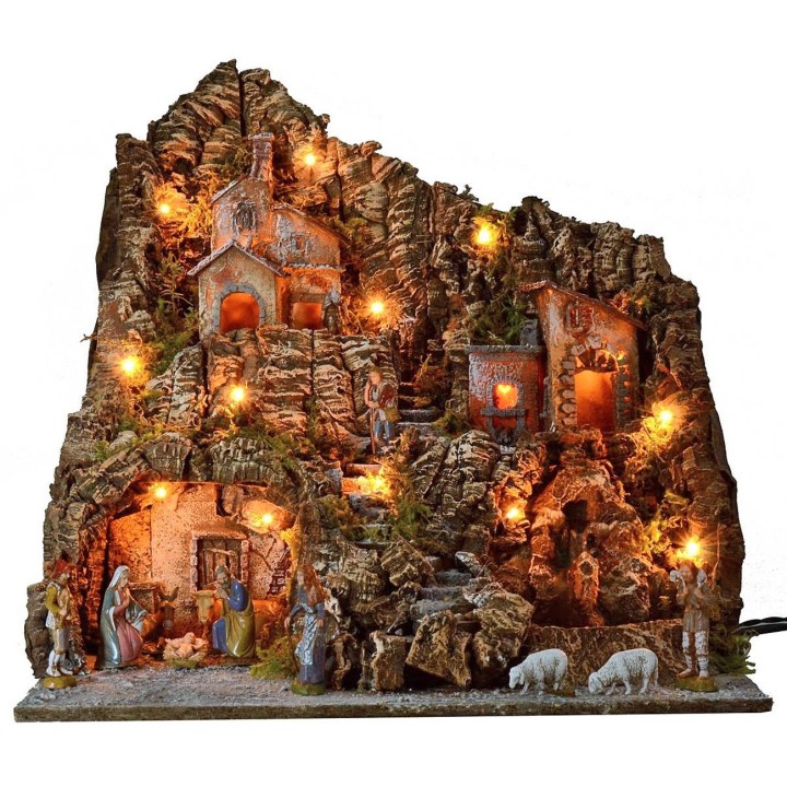 Belén iluminado completo con estatuas Landi y horno y cascada