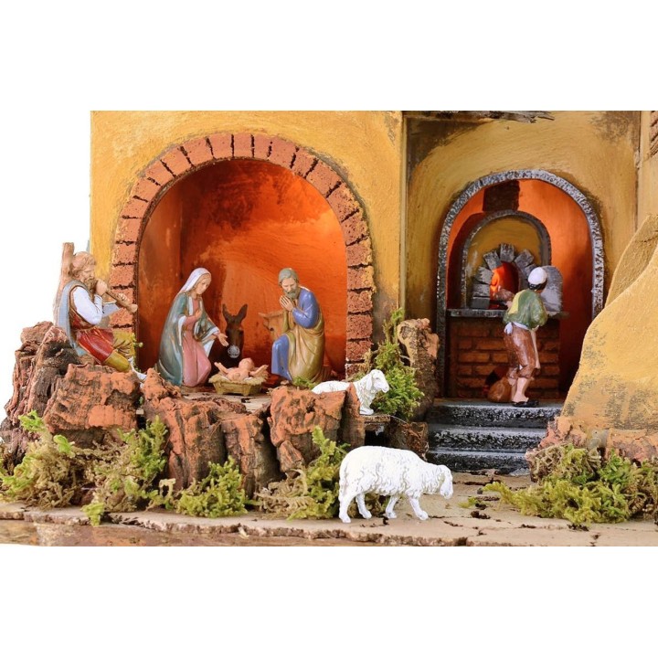 Illuminated nativity scene complete with Landi statues with