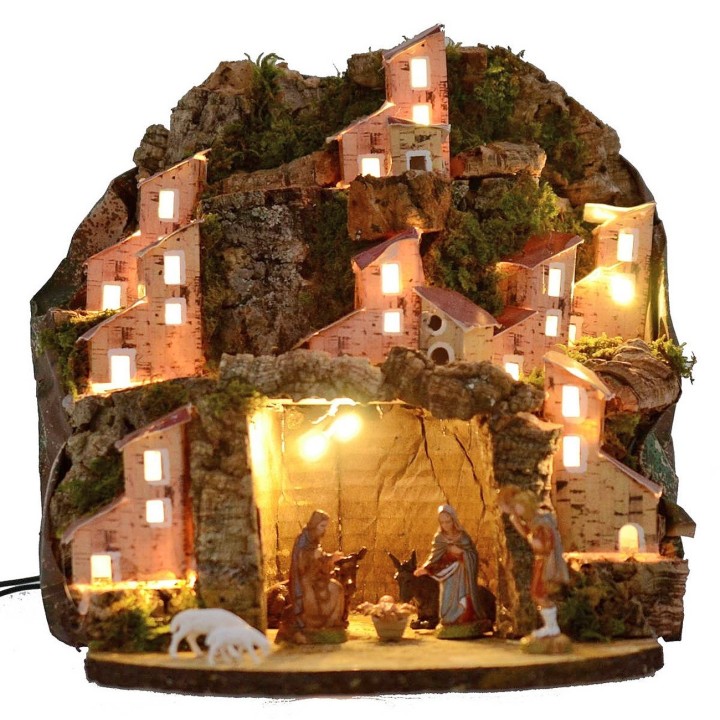 Belén iluminado completo con estatuas Landi con pueblo y cueva