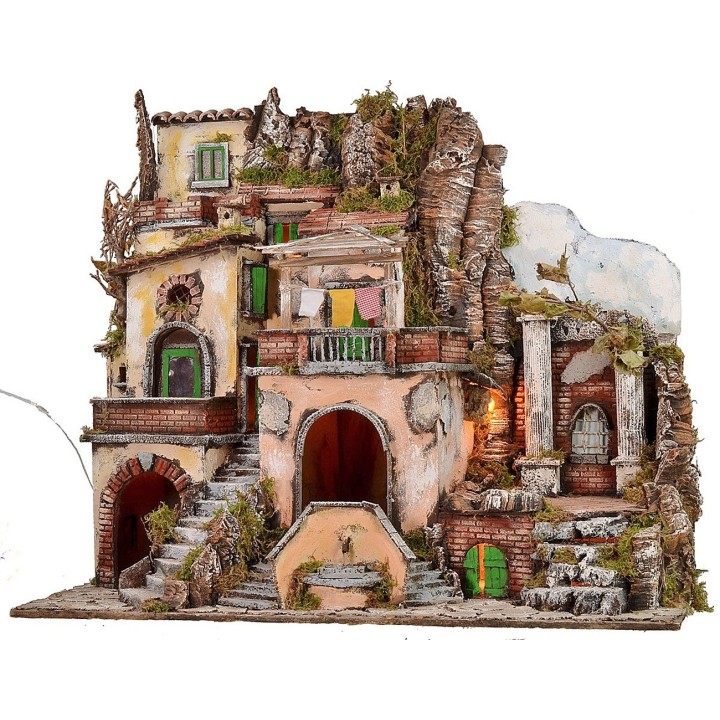 Illuminated nativity scene with functioning fountain and fire