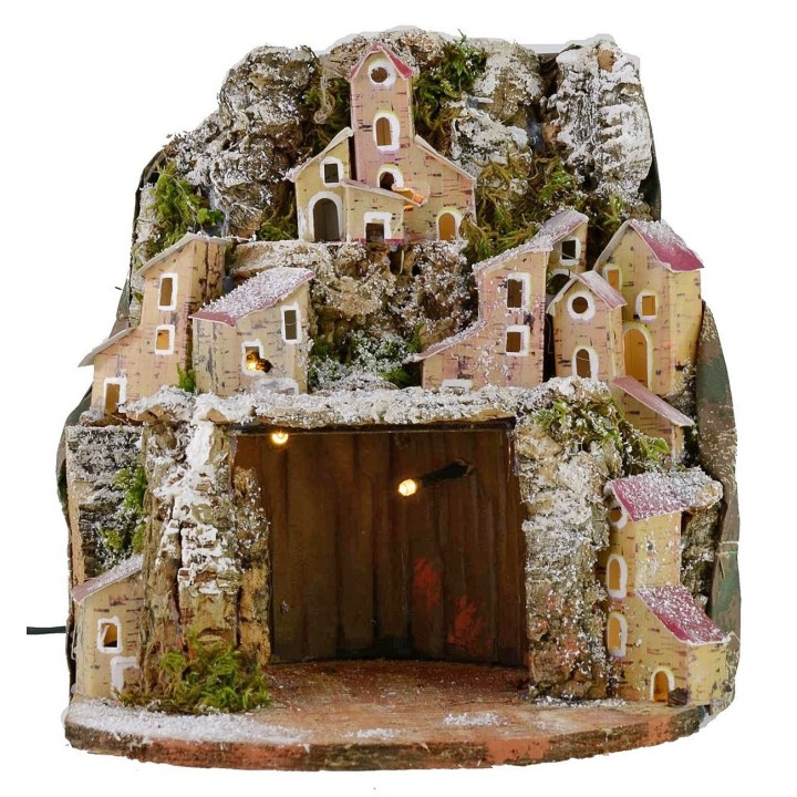 Belén nevado iluminado con pueblo y cueva de 20x20x24 cm h.