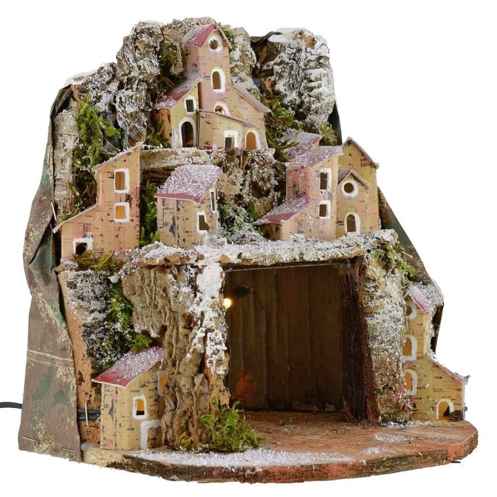 Presepe innevato illuminato con villaggio e grotta cm 20x20x24 h