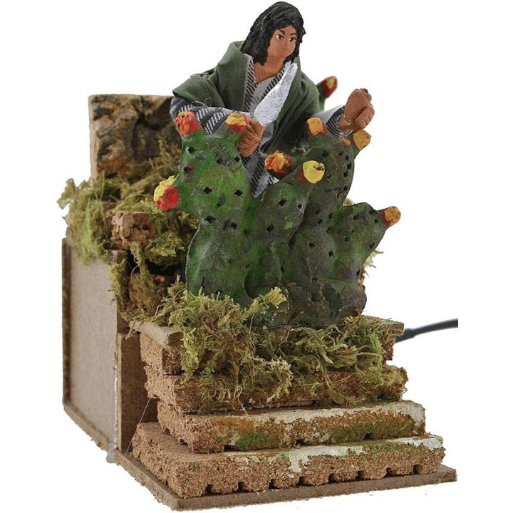 Contadino che taglia i fichi in movimento
