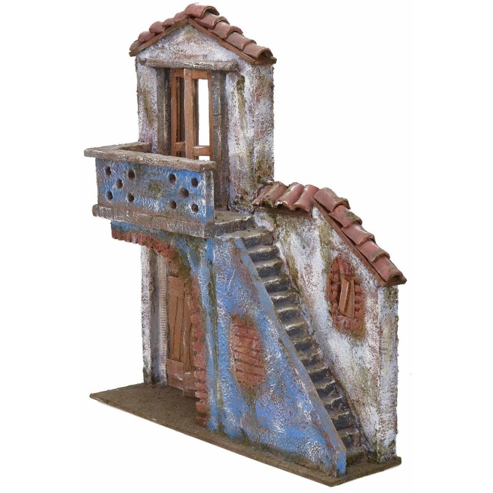 Fachada de casa con escalera y balcón de 27,5x7x31 cm de altura
