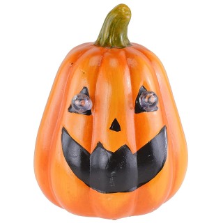 Pumpkin with battery-powered illuminated eyes for Halloween