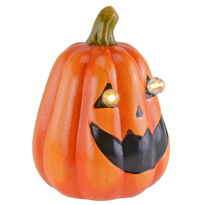 Pumpkin with battery-powered illuminated eyes for Halloween