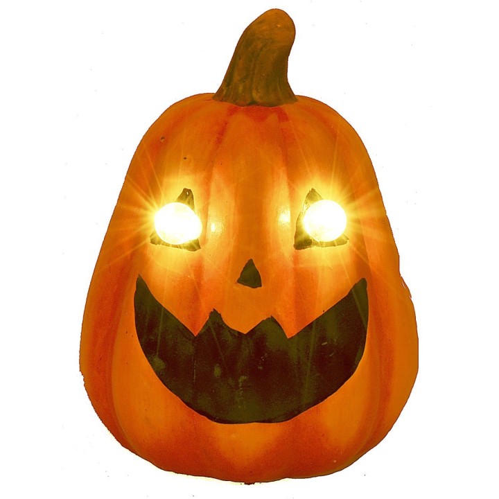 Pumpkin with battery-powered illuminated eyes for Halloween