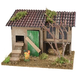 Nativity scene setting with chicken coop and rabbit hutch