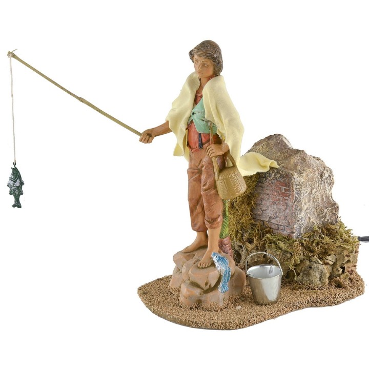 Pescador sobre la roca en movimiento 19 cm Fontanini
