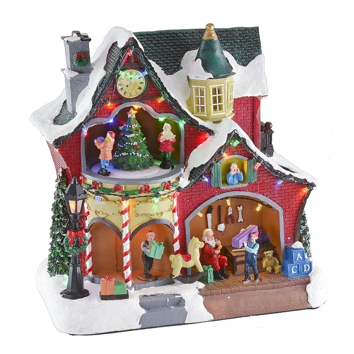 Escenario navideño con casita y carrusel completo con música e
