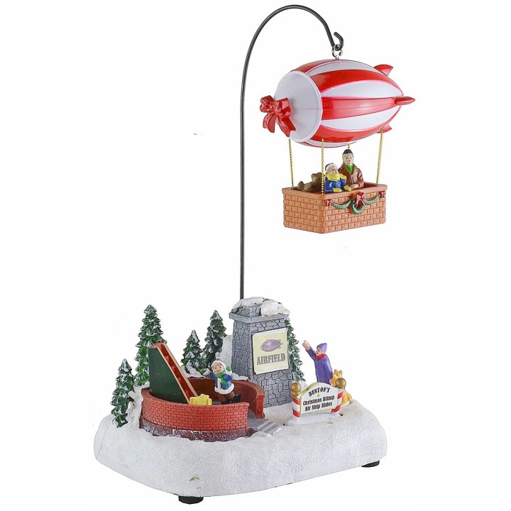 Christmas scenario with battery-operated airship complete with