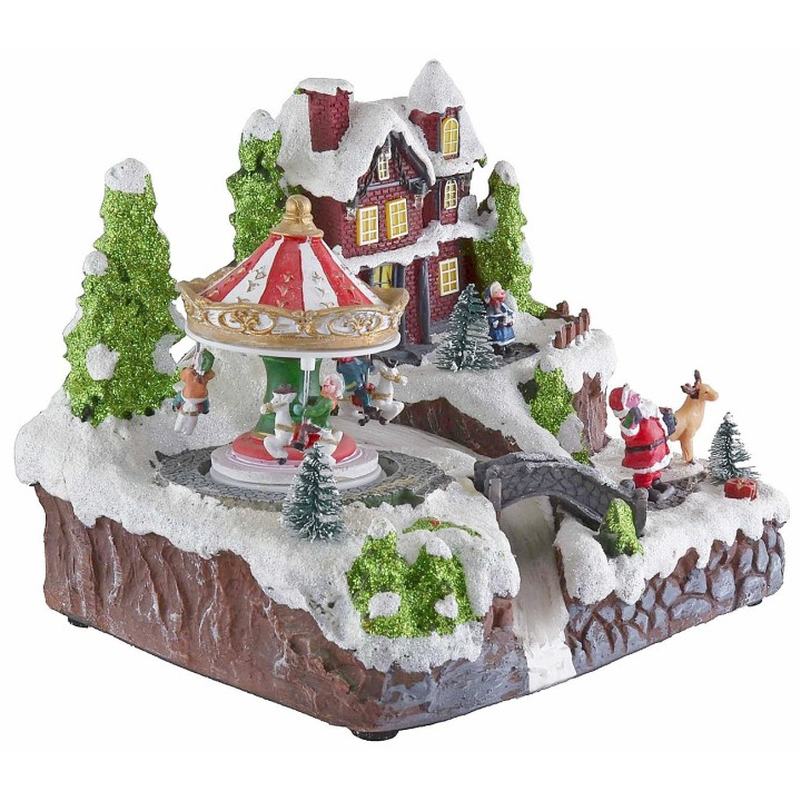 Pueblo navideño con carrusel que funciona a pilas con luces y