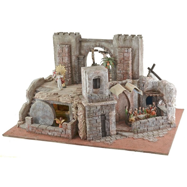 Illuminated Easter nativity scene complete with statues