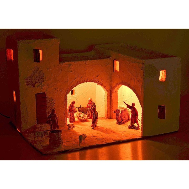 Illuminated Arabic nativity scene complete with figurines